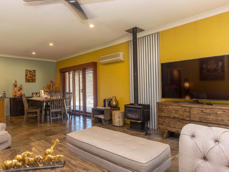 Hunter Valley accommodation with fireplace at Wattle Wilde